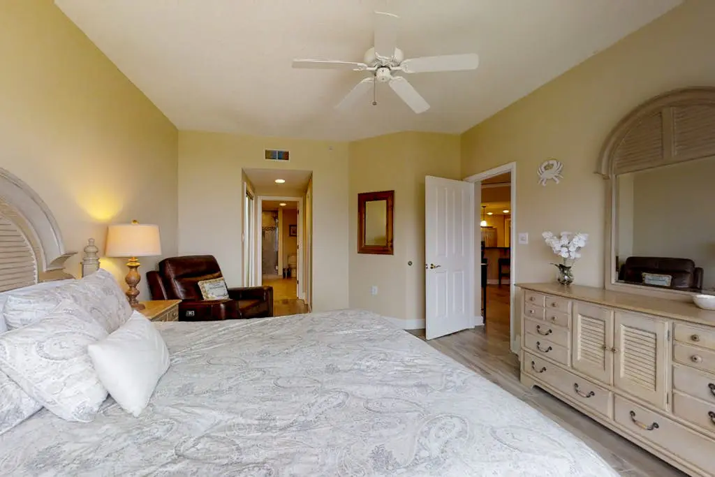 Dreamy condo on the beach w/ balcony view, shared pool, & charming decor