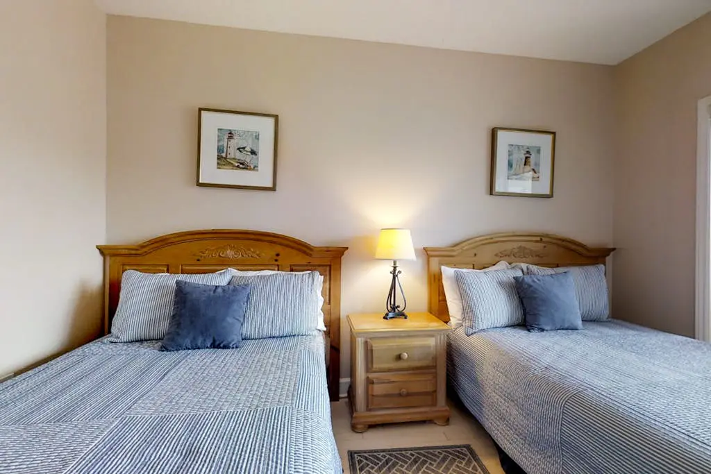 Dreamy condo on the beach w/ balcony view, shared pool, & charming decor