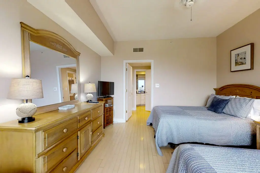 Dreamy condo on the beach w/ balcony view, shared pool, & charming decor