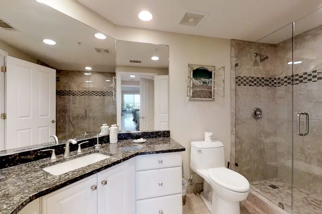 Dreamy condo on the beach w/ balcony view, shared pool, & charming decor