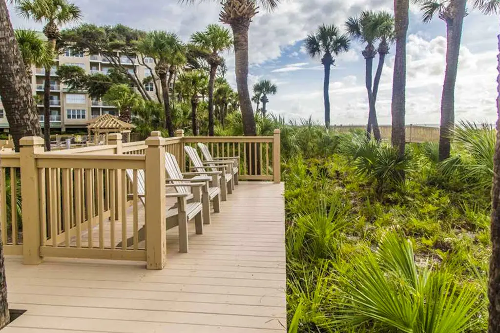 Dreamy condo on the beach w/ balcony view, shared pool, & charming decor