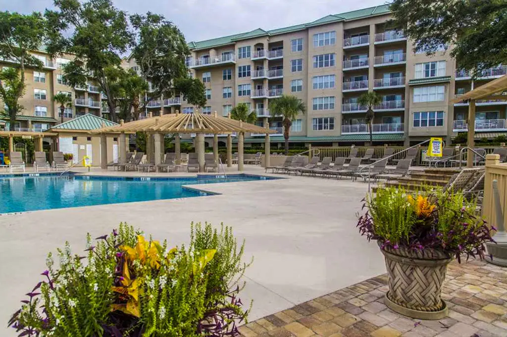 Dreamy condo on the beach w/ balcony view, shared pool, & charming decor