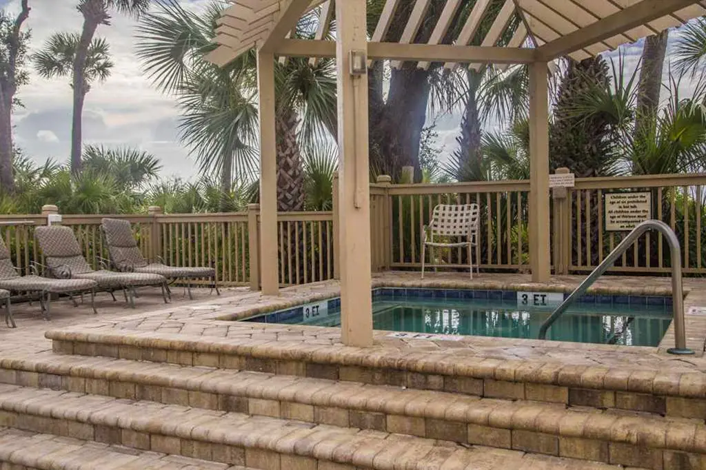 Dreamy condo on the beach w/ balcony view, shared pool, & charming decor