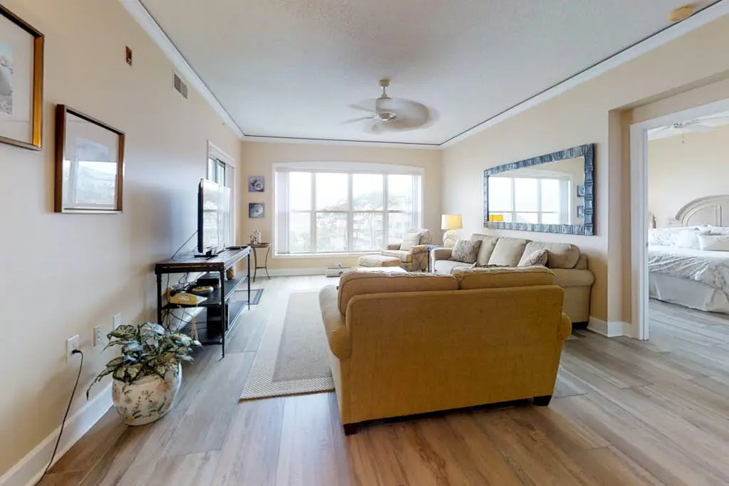 Dreamy condo on the beach w/ balcony view, shared pool, & charming decor