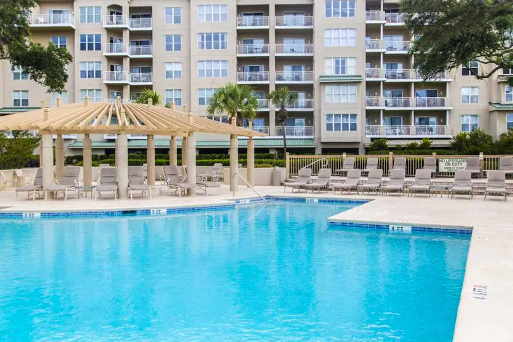 Dreamy condo on the beach w/ balcony view, shared pool, & charming decor