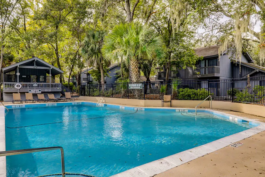 Bright, charming condo with screened porch, shared pool, and easy beach access