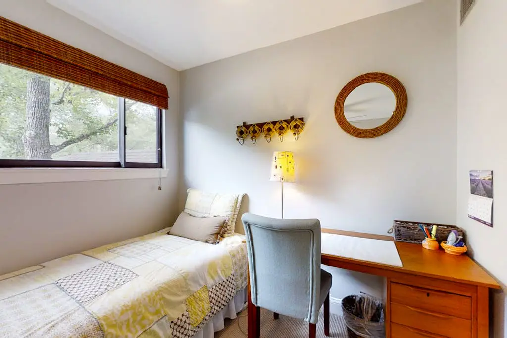 Bright, charming condo with screened porch, shared pool, and easy beach access