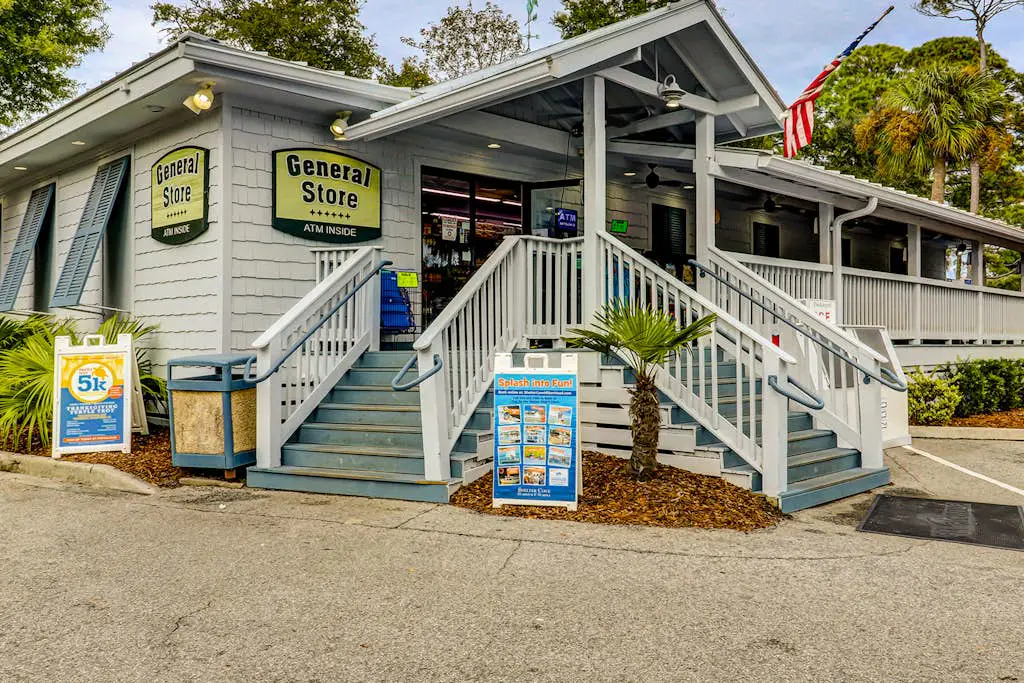 Bright, charming condo with screened porch, shared pool, and easy beach access