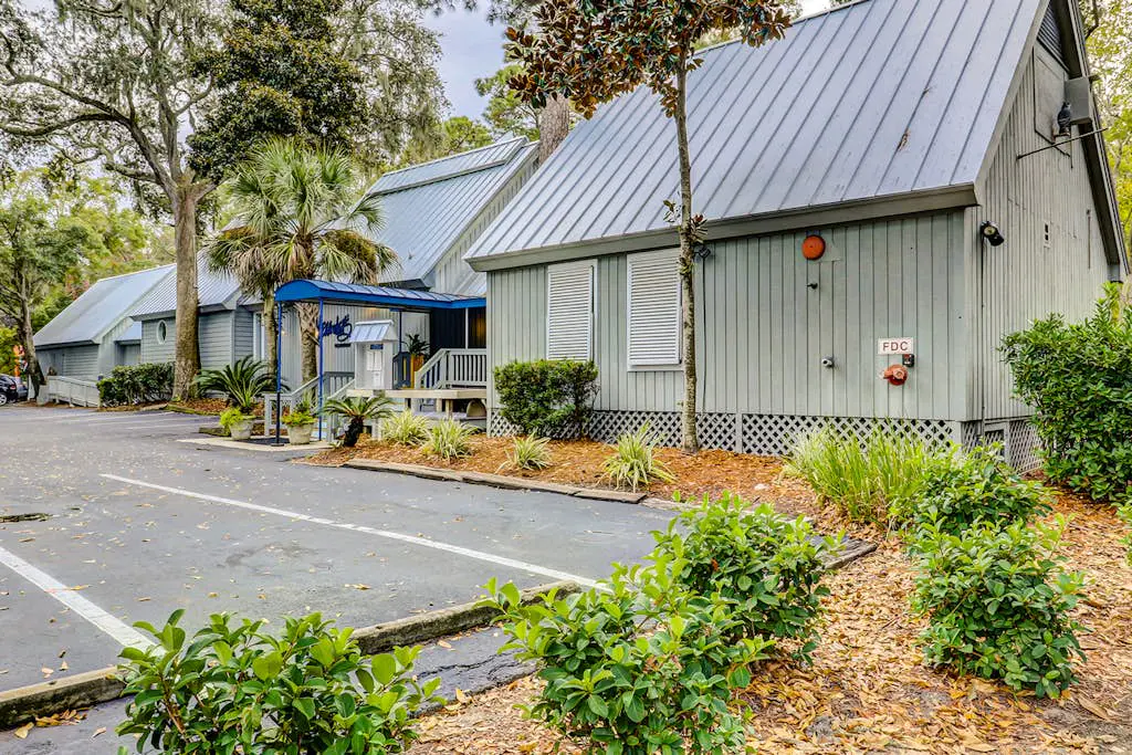 Bright, charming condo with screened porch, shared pool, and easy beach access