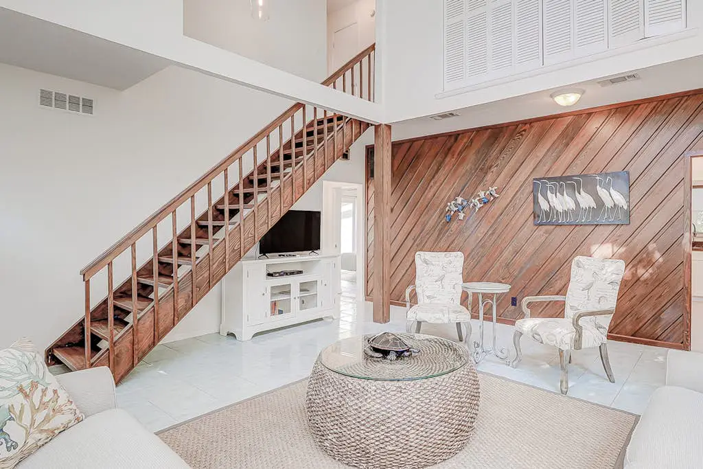 Dog friendly home with an enclosed yard, pool deck, & private pool