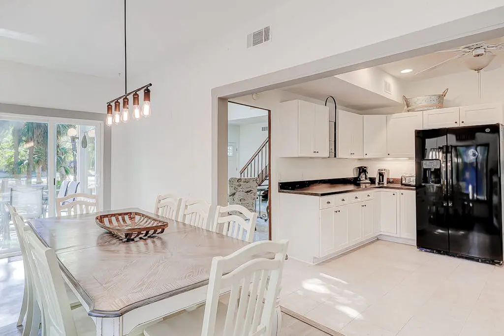 Dog friendly home with an enclosed yard, pool deck, & private pool