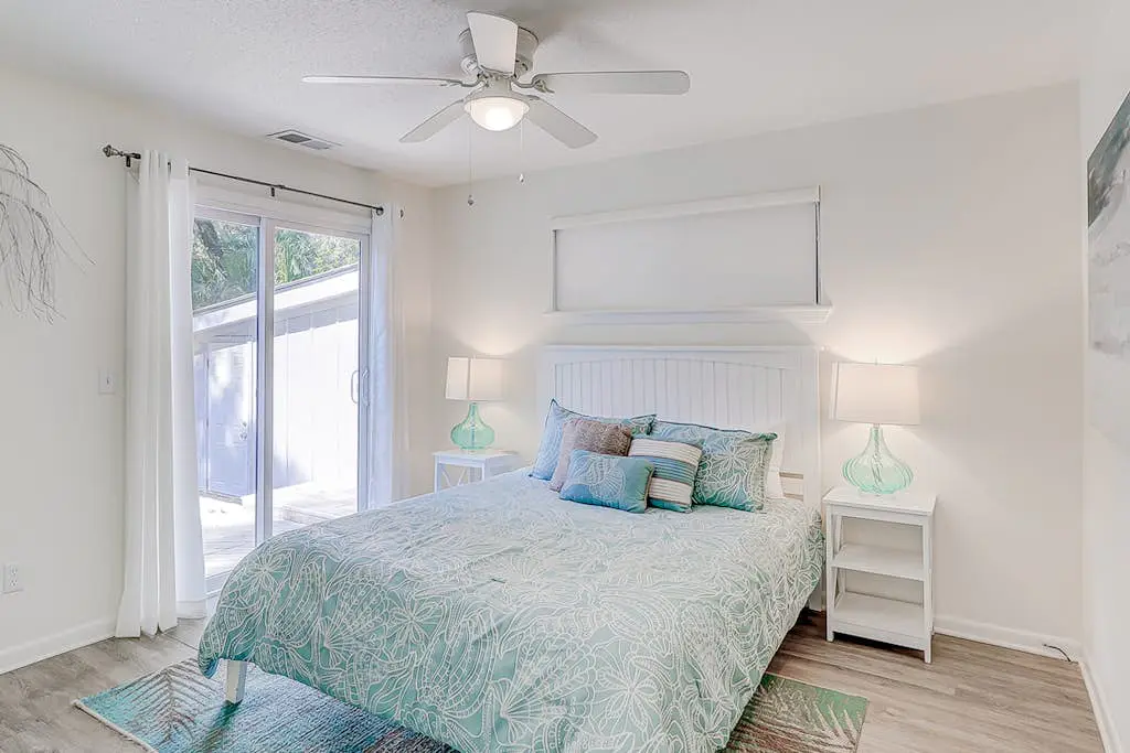 Dog friendly home with an enclosed yard, pool deck, & private pool