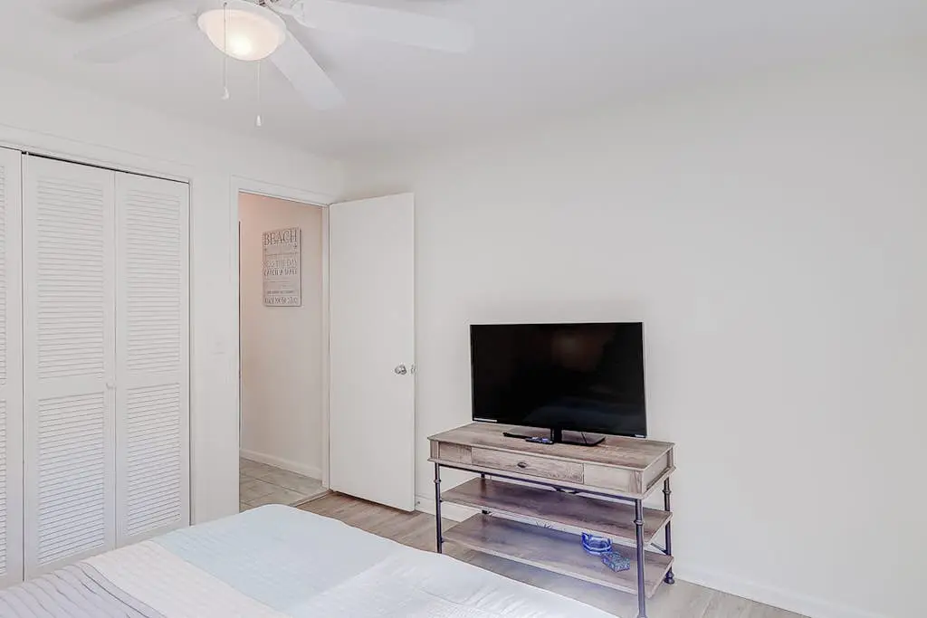 Dog friendly home with an enclosed yard, pool deck, & private pool