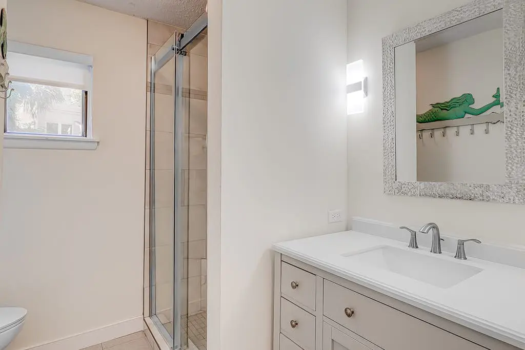 Dog friendly home with an enclosed yard, pool deck, & private pool