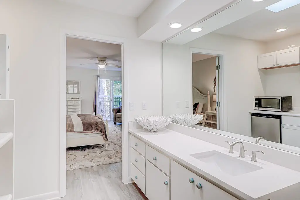Dog friendly home with an enclosed yard, pool deck, & private pool
