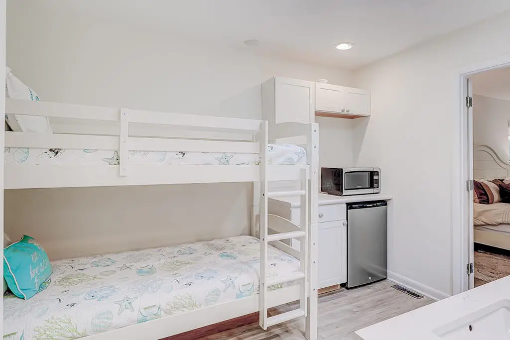 Dog friendly home with an enclosed yard, pool deck, & private pool