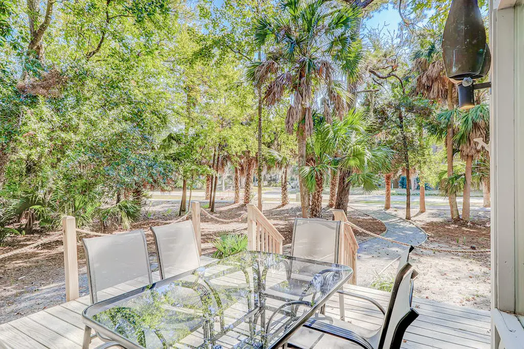 Dog friendly home with an enclosed yard, pool deck, & private pool