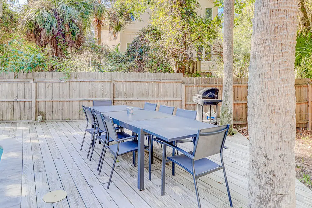Dog friendly home with an enclosed yard, pool deck, & private pool