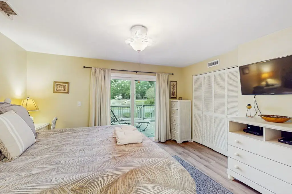 Gated community home w/ vaulted ceilings, lagoon, & pools - near beaches