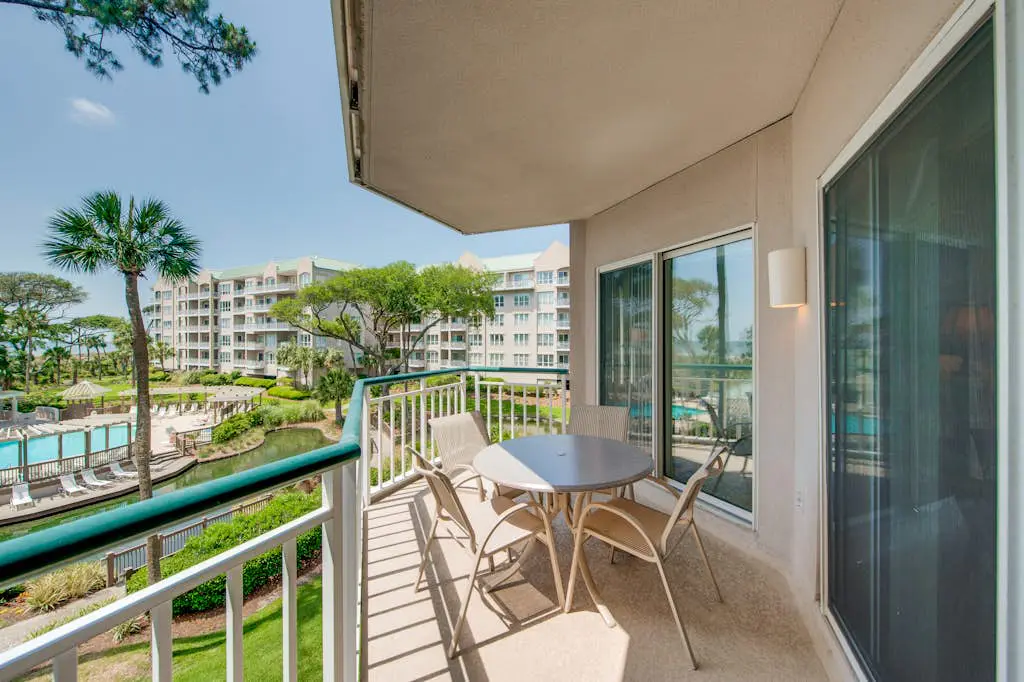 Beach dream w/ balcony view & shared pool - steps from the beach