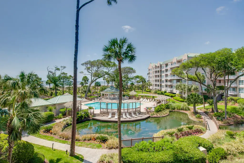 Beach dream w/ balcony view & shared pool - steps from the beach
