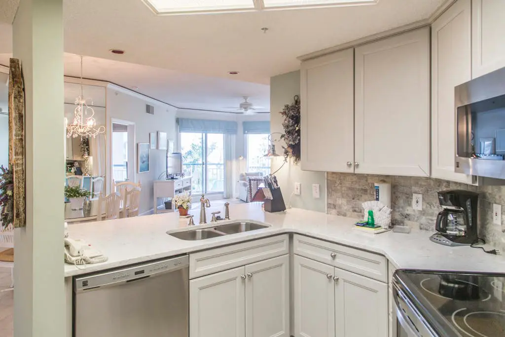 Beach dream w/ balcony view & shared pool - steps from the beach