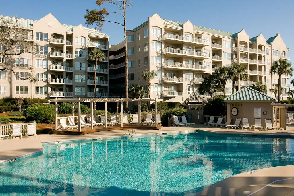 Beach dream w/ balcony view & shared pool - steps from the beach