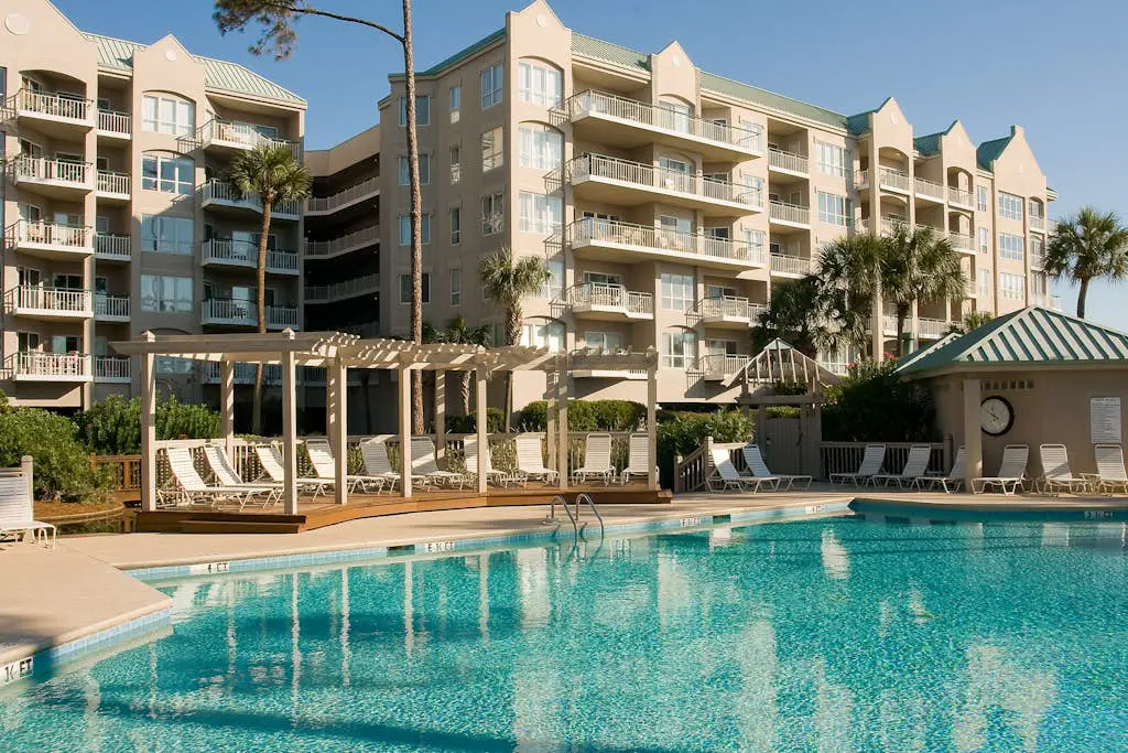 Beach dream w/ balcony view & shared pool - steps from the beach