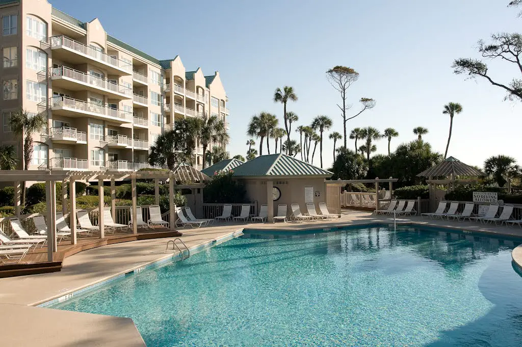 Beach dream w/ balcony view & shared pool - steps from the beach