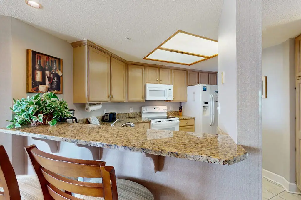 Island getaway by the ocean w/ balcony view & shared pool - beach access