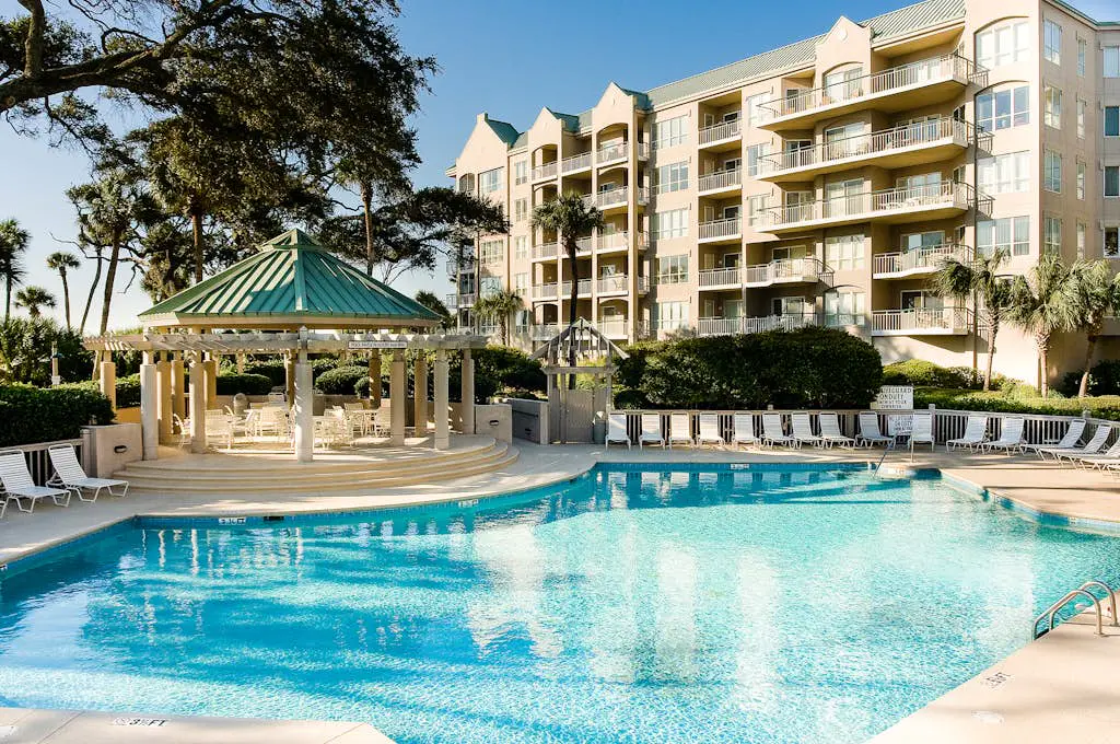 Island getaway by the ocean w/ balcony view & shared pool - beach access