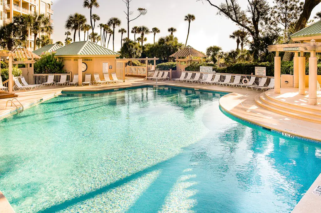 Island getaway by the ocean w/ balcony view & shared pool - beach access