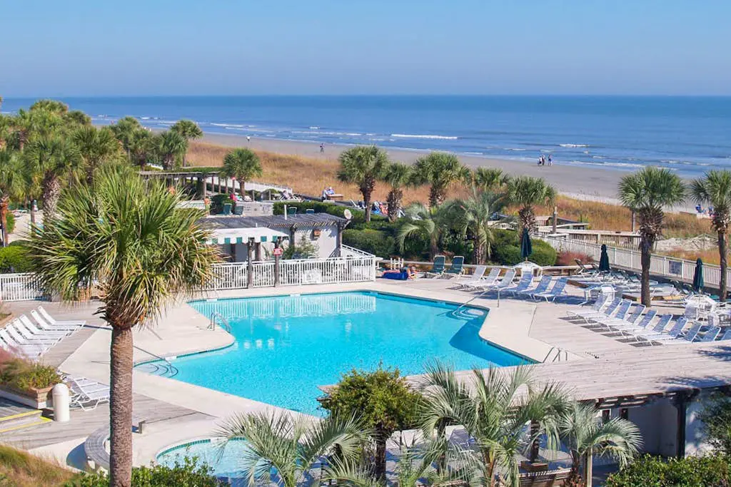 Oceanfront condo with pools, hot tubs, WiFi, washer/dryer, & central A/C
