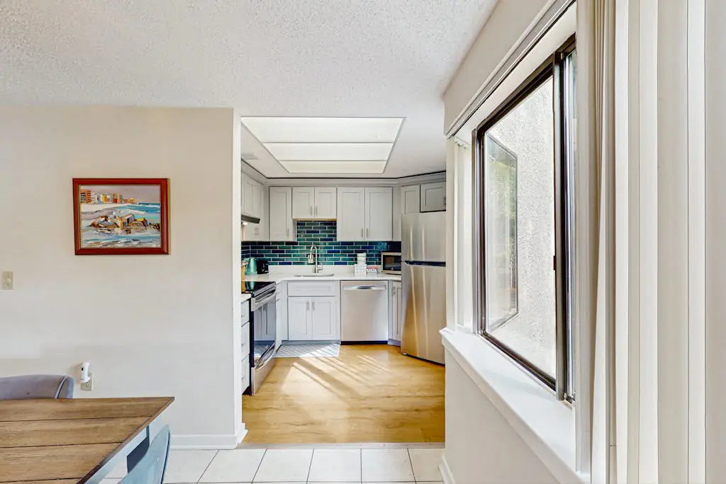 Inviting family-friendly condo with balcony, central AC, & outdoor pool
