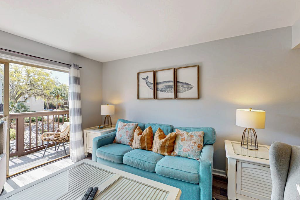 Second Floor Condo Steps to Coligny with Shared Pool, Central AC, & Beach Access