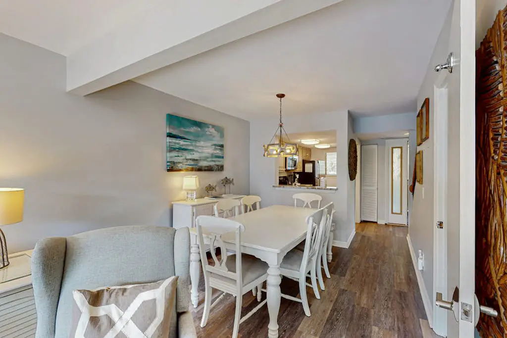 Second Floor Condo Steps to Coligny with Shared Pool, Central AC, & Beach Access