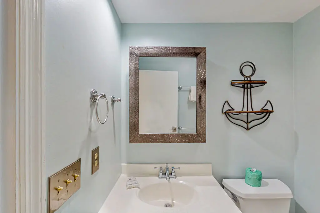 Second Floor Condo Steps to Coligny with Shared Pool, Central AC, & Beach Access