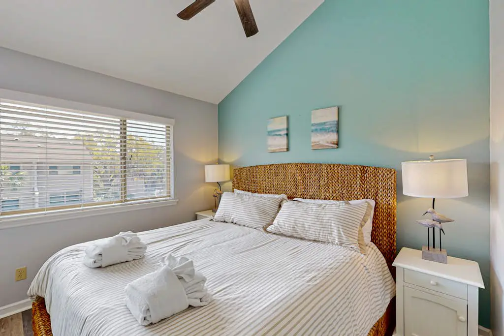 Second Floor Condo Steps to Coligny with Shared Pool, Central AC, & Beach Access