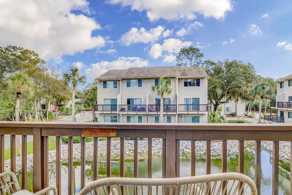 Second Floor Condo Steps to Coligny with Shared Pool, Central AC, & Beach Access