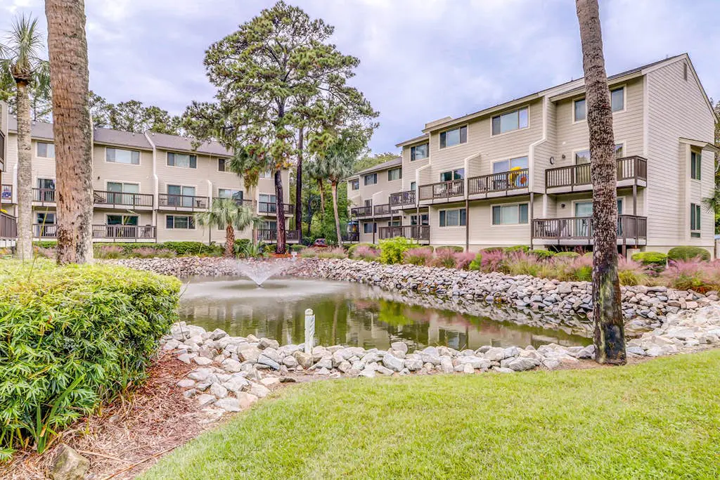 Second Floor Condo Steps to Coligny with Shared Pool, Central AC, & Beach Access