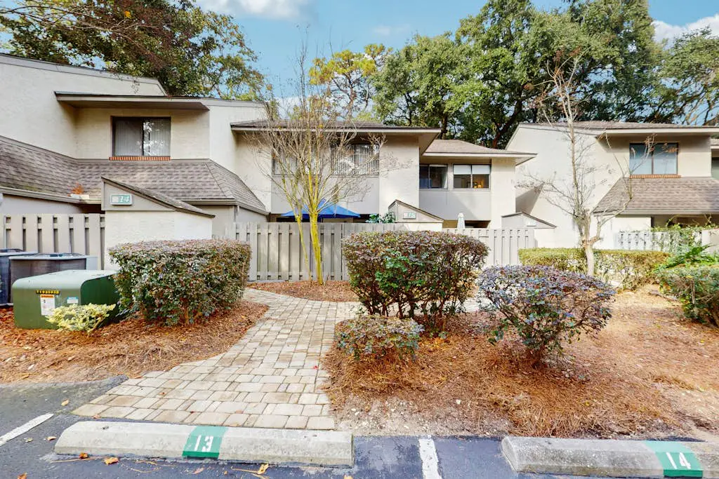 Dog-Friendly Condo w/ Fast WiFi, a Patio, & Shared Pool - Walk to the Beach