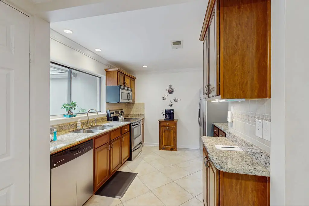 Dog-Friendly Condo w/ Fast WiFi, a Patio, & Shared Pool - Walk to the Beach