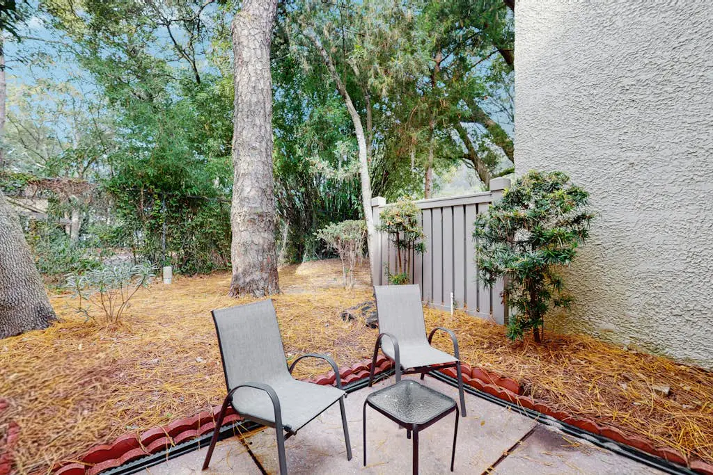 Dog-Friendly Condo w/ Fast WiFi, a Patio, & Shared Pool - Walk to the Beach