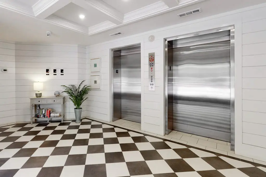 Second-floor condo with balcony, shared outdoor pool, central AC
