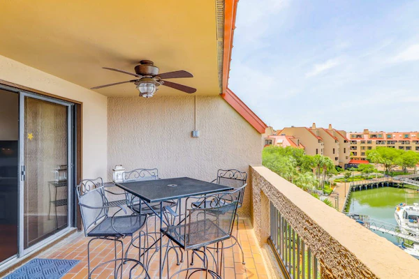 Penthouse living at Shelter Cove Marina with balcony, harbor view, pool & tennis