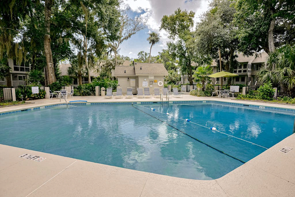 Villa with saltwater pool, golf, firepit, hot tub, & private beach access