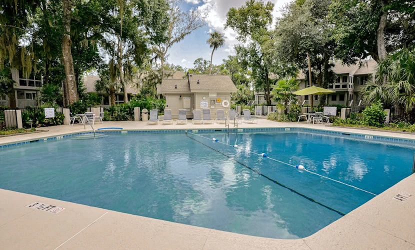 Villa with saltwater pool, golf, firepit, hot tub, & private beach access