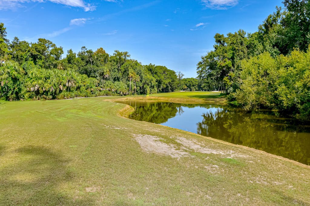 Villa with saltwater pool, golf, firepit, hot tub, & private beach access
