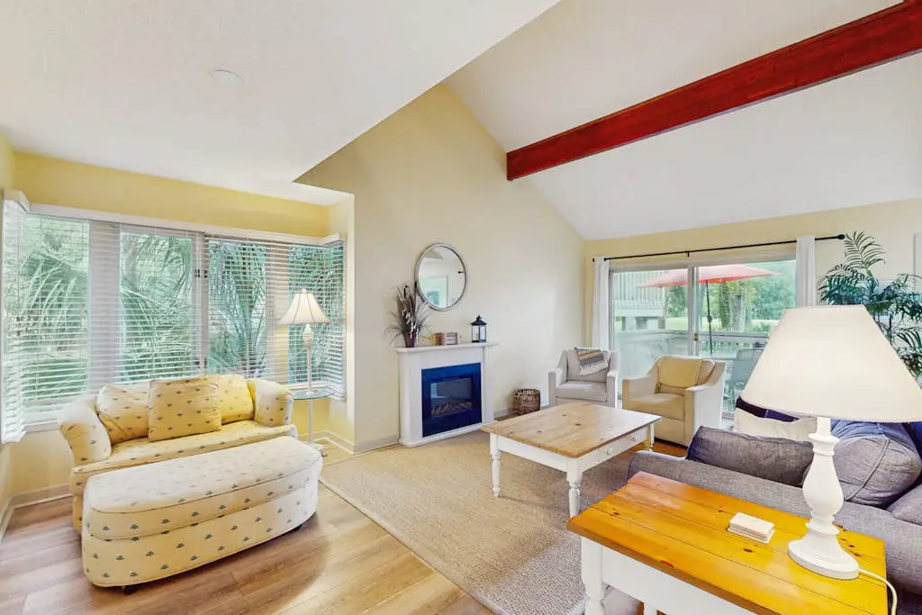Villa with saltwater pool, golf, firepit, hot tub, & private beach access
