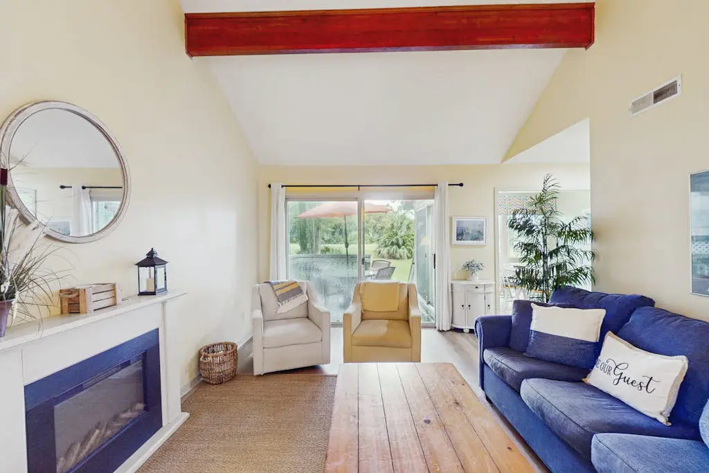 Villa with saltwater pool, golf, firepit, hot tub, & private beach access